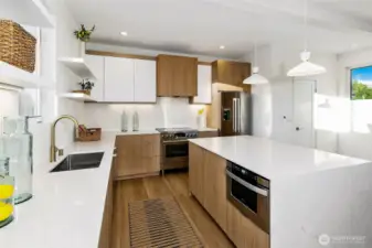 Kitchen boasts a waterfall island and Bosch appliances.  Most builders do not have higher end appliances