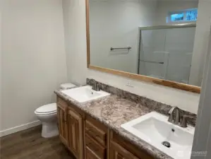 Primary bath with double vanities.