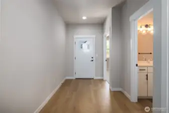 LVP flooring in the entry, great room, kitchen and dining room.