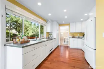 Kitchen with entry to dining room at the back.