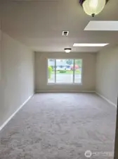 Other view of family room w/ skylights