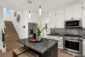 Photos are of a previous model of similar floorplan. Details, surfaces and features may differ. For demonstration purposes only.