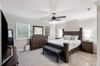 Spacious primary suite has fresh paint.