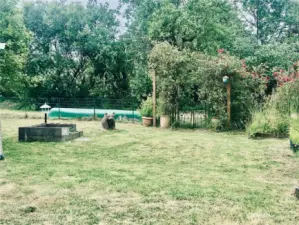 Private yard backs up to a green space