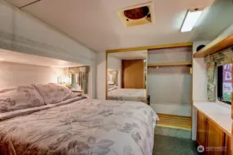 Bedroom with closet and storage space