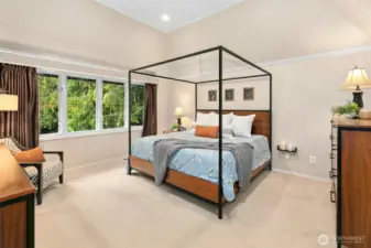 Very spacious primary retreat with motorized blinds.