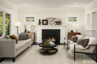 Formal living room with gas fireplace.