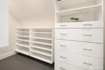 1 of 2 walk-in closets in the primary. All fully built out.
