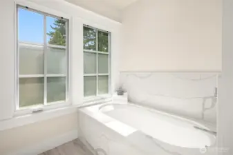 Primary bathroom soaking tub.