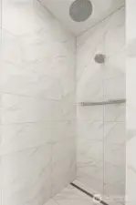Large walk-in shower in primary bathroom.