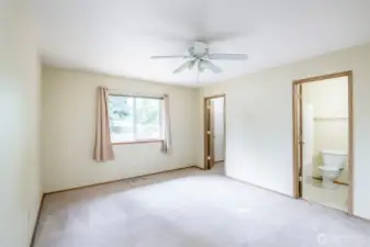 Primary bedroom, walk in closet and full bathroom.