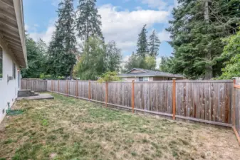 Fully fenced backyard.