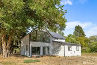 Peaceful country setting with mature trees for privacy.