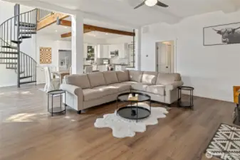 Spacious living room with updated flooring throughout.