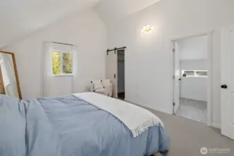 Primary suite comes complete with a walk-in closet and private bath.