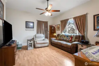 Nice size living area with laminate flooring.