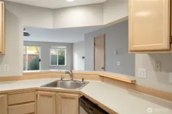 Kitchen out to main room. Door is 1/2 Bath