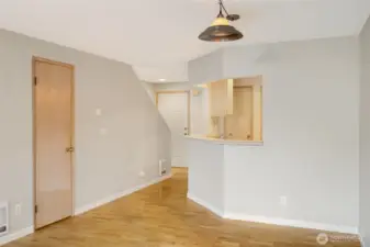 Main room back to front door and stairs.