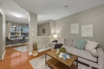 Step inside and instantly feel at home. The entry opens to warm bamboo floors, soft neutral tones, and a floor plan that maximizes comfort and privacy.