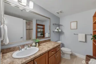 A good sized full bathroom with a tub and shower.