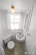 What a sweet little half bath.