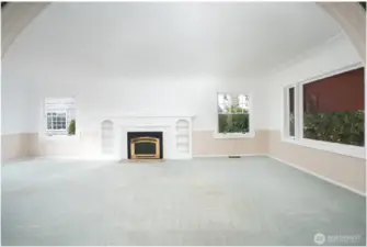 The huge picture window in the living room, along with 2 more windows, allows for natural light- even on our grey days.