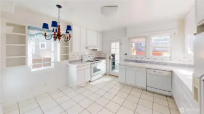 The large eat in kitchen has great bones.  Keep it with informal dining or blow it out and make a chef's dream kitchen- the dining room is adjacent so the op