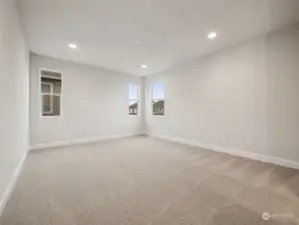 Oversized primary bedroom. Photos are of the actual home.