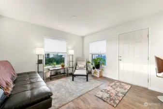 Laminate flooring throughout the main living areas and the kitchen.