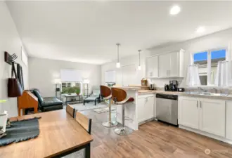 The kitchen has enough space for a small dining table.