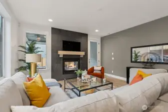 Floor to ceiling tile on the fireplace, and wired for your TV.