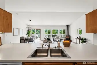 Open-concept floor plan with spacious flow between kitchen, dining, and living areas