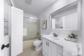 Laundry in closet in main bath.