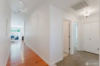 Looking from the front door down the hall to your living room