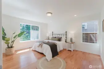 Ample space in this relaxing primary bedroom