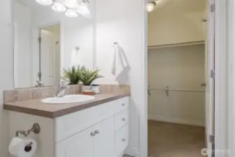 Walk in closet just off the primary bathroom