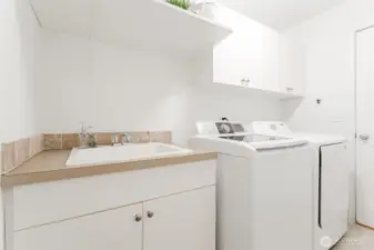 Laundry room with deep utility sink