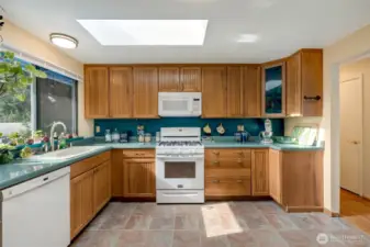 Beautiful kitchen w/ wood cabinets.