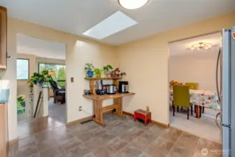 Looking out to dinning room and living room from upper level kitchen