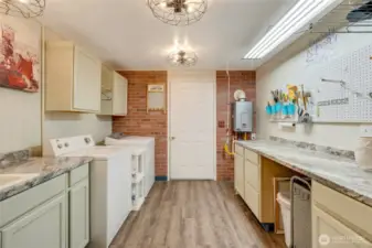 Laundry room w/ so much room and storage!