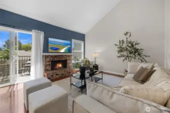 Charming wood burning firplace compliment the open space and soaring vaulted ceilings with plenty of natural light