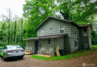 The existing house has 2 conforming bedrooms and 1 bathroom upstairs with a separate, non-conforming unit below with 3/4 bath. Both spaces have tenants paying monthly rent. Tenants prepared to move with proper notice.