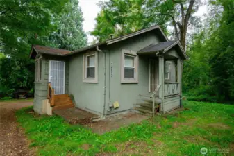 Shy 5 acre parcel - Zoned R6 with 1,608sf home built in 1938. The red outline shows approximate property boundaries. Buyer to satisfy all information to their satisfaction. Back of property has street access via 120th Ave SE.