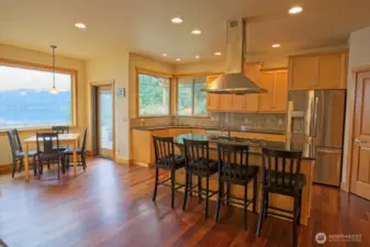 Open Kitchen and eating area both open on to deck with views