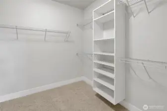 Walk-in closet with built in shelving (Photos from lot 9B)