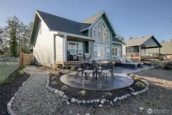 Custom stamped concrete patio, deck, backyard beach a low maintenance landscaping