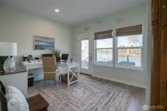 2nd bedroom/office on the main overlooking the lake. The perfect place to work or relax.