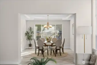 Formal dining room conveniently located between the living room and kitchen