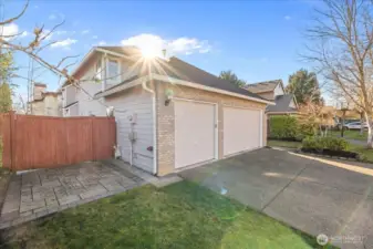 Extra parking or storage on the side of the home as well