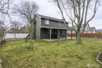 large backyard still has plenty of grass space and is fully fenced too!